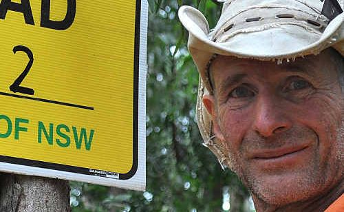 Greens candidate Jeremy Bradley examining koala scratches spanning a number of years, on a tree in the Lorne Valley beside the Green Highway that has a Forests NSW sign nailed to it. He said Forests NSW claimed there was no evidence of koalas in this area. Greens candidate Jeremy Bradley examining koala scratches spanning a number of years, on a tree in the Lorne Valley beside the Green Highway that has a Forests NSW sign nailed to it. He said Forests NSW claimed there was no evidence of koalas in this area.